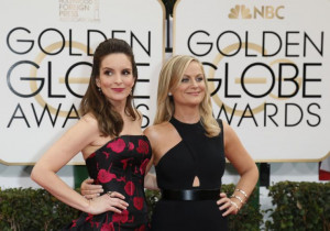 Actresses Tina Fey (L) and Amy Poehler (R) at the 71st annual Golden ...