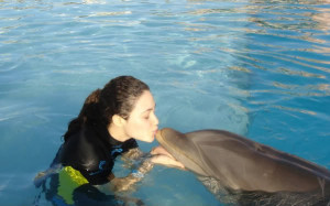 dolphin kisses Emmy Rossum, plus amazing dolphin ring video