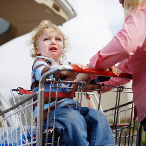Child Throwing Tantrum In Store Toddler crying in grocery cart