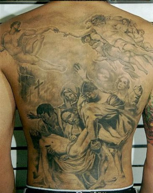 ... ban tattoos? No, says shopping mall church that has cage fighting, too