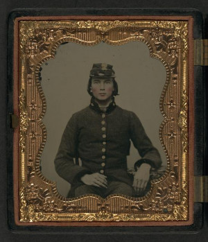 young soldier in Confederate uniform and South Carolina forage cap ...