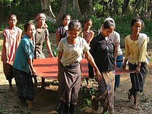 Carrying steel plate in Laos