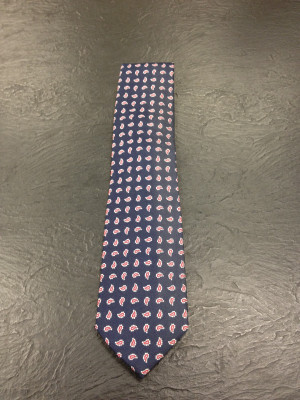 My husband spotted the exact same tie at Mens Wearhouse.