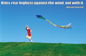 Kites rise highest against the wind…