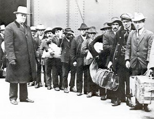 As you can see, they are all men. They are waiting at Ellis Island ...