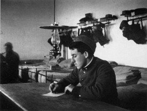 André Kertész: Soldier writing, Gorz, Austria (now Italy) , 1915