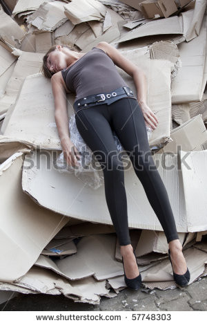 crime scene - female victim lying in paper cartons - stock photo HD ...