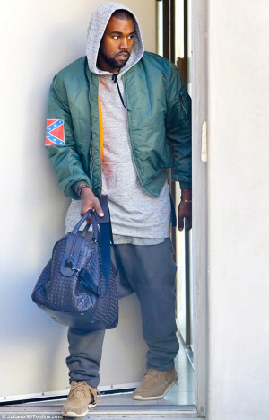 Defiant: Kanye West wore a jacket bearing the Confederate Flag as he ...