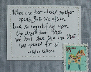 one door closes another opens Card with written Helen Keller quote ...