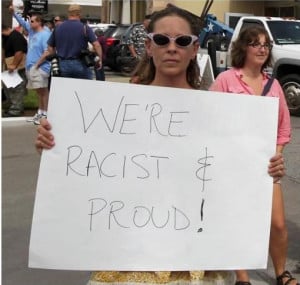 Woman Bearing ‘Racist And Proud’ Sign Is Not A George Zimmerman ...