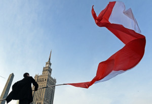 ... man raises Flag during Independence Day Images | Patriotic Wallpapers