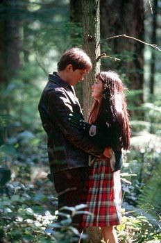 Snow falling on cedars