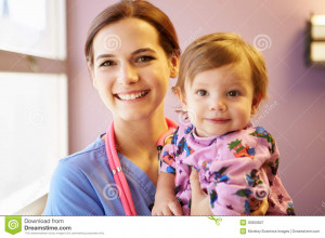 Young Girl Being Held By Female Pediatric Nurse Wearing A Stethoscope ...