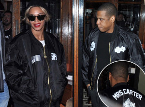 jay z is very supportive of his wife while out and about with his wife ...
