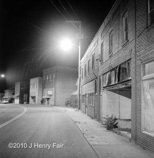 Shuttered stores at night in Whitesville, WV
