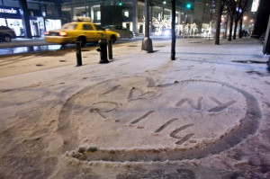 love New York 2.1.14” is stenciled into the snow during winter storm ...
