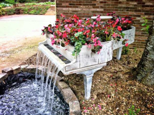 Grand piano water fountain and container for decorating with flowers