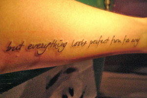 Beautiful quotation tattoo on arm. Photo by deadoll/flickr