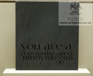 ... Rubincam titled: 'Quote from Elf (Carved Slate Fun Quote sculpture