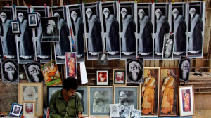 street vendor sells photographs of Indian poet Rabindranath Tagore ...