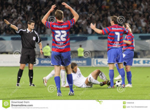 Soccer Players And Referee Royalty Free Stock Photo Image