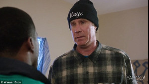 Getting into it: James sports a beanie emblazoned with his gang name ...