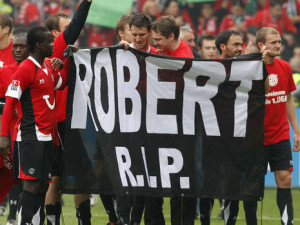 Hannover 96- ENKE Fans at a soccer game to show their sorrow about ...