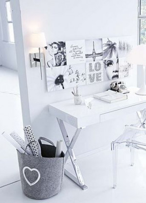 white office - black and white prints on wall