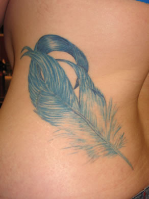 Feather Tattoo With Quote Ribs