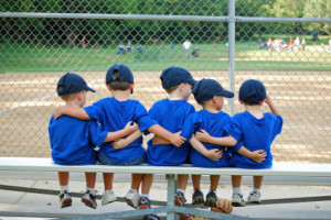 Little League baseball teammates