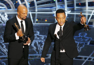 Image: Legend and Common accept Oscars for best original song