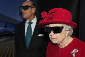 The Queen and the Duke of Edinburgh wear 3D glasses to watch a display ...