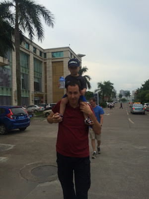 Riding on Daddy's shoulders as we walked 15 minutes to the restaurant