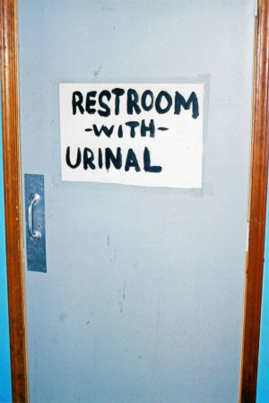Gender-neutral restroom signs.