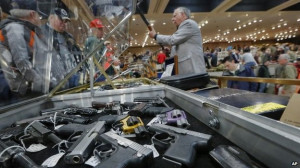 In this 26 January, 2013 file photo, handguns appear on display at the ...