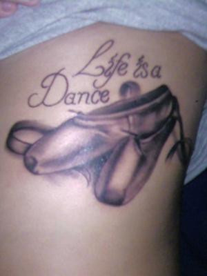 The tattoo I chose to get is of ballet slippers and the words “Life ...