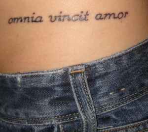 Latin text hip tattoo meaning 