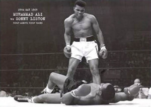 Photgraph of Muhammad Ali standing over a prostrate Sonny Liston