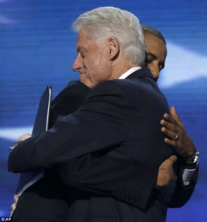 President Barack Obama hugs Former President Bill Clinton after the ...