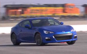 2013 Subaru BRZ in blue taking a corner at speed - video screencap