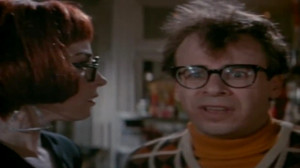 Annie Potts (Janine Melnitz) and Rick Moranis (Louis Tully) in ...