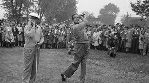 Bob Hope takes a swing while fellow linksman Bing Crosby registers an ...