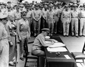 Fleet Admiral Chester W. Nimitz, U.S.N. signs the Instrument of ...