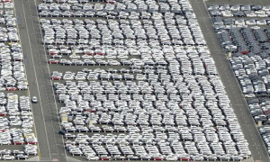 Cars for export stand in a parking area at a shipping terminal in the ...