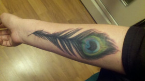 Tattoos with feathers and sayings