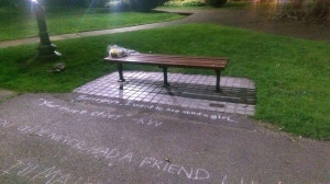 flowers and wrote quotes in chalk on the sidewalk at a Boston bench ...