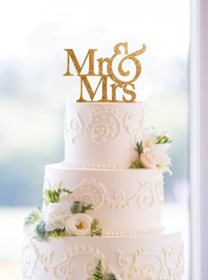 ... like glitz and glamour, check out this sparkly Mr. and Mrs. topper
