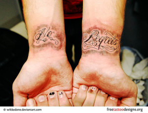 No regrets tattoo on a man's wrists