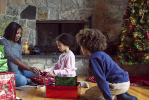 Family Wrapping Christmas Presents Together - Cavan Images/Digital ...