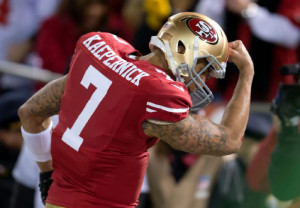 San Francisco 49ers quarterback Colin Kaepernick (7) celebrates his ...